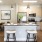 Well-lit kitchen with state of the art stainless steel appliances in oakwood apartments