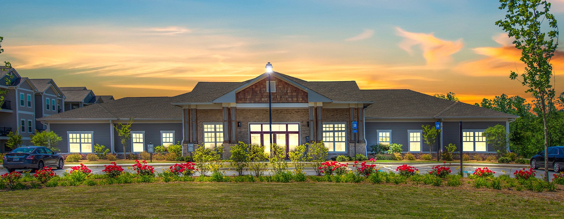 Exterior view of the leasing office during sunset